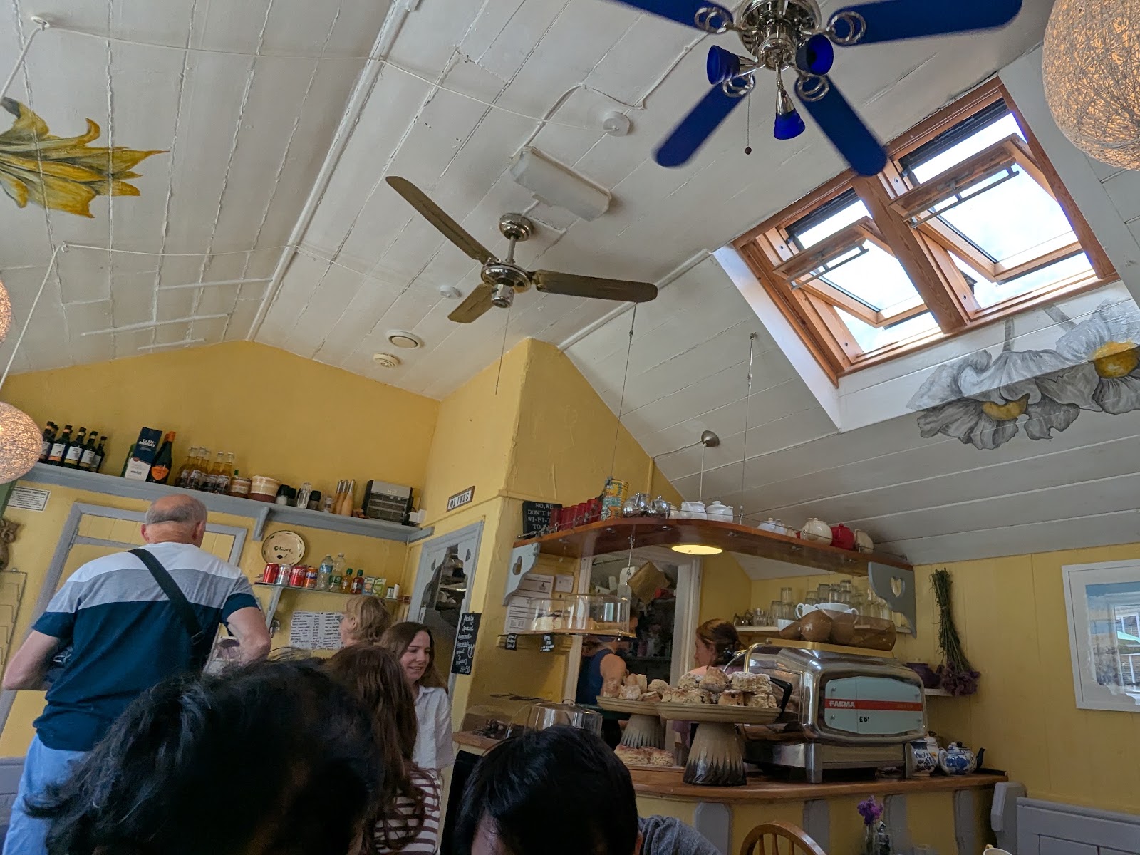 Olives Cafe bright interior with scones on the counter