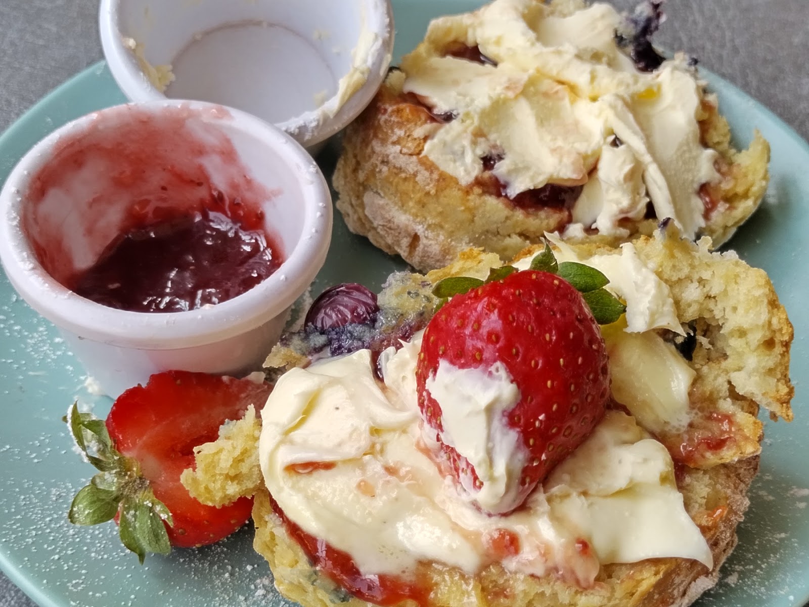 Cream tea with jam, clotted cream and strawberries
